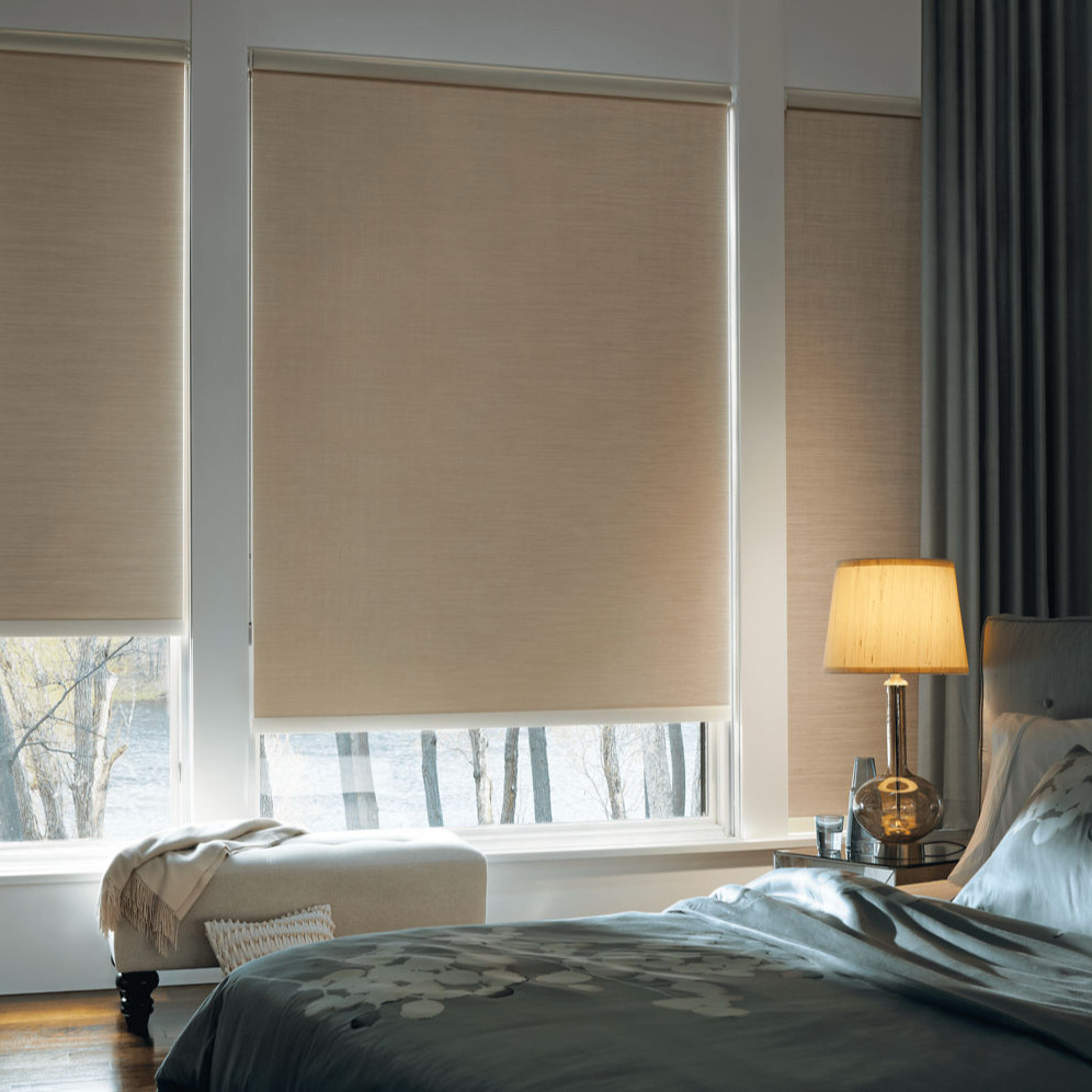 Room darkening shade in a bedroom
