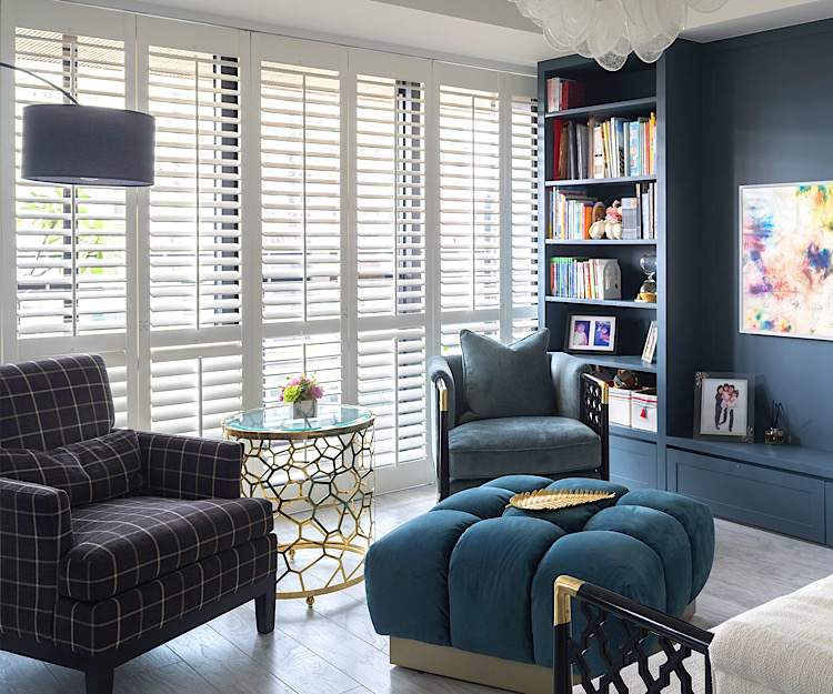 Bright living room with white plantation shutters
