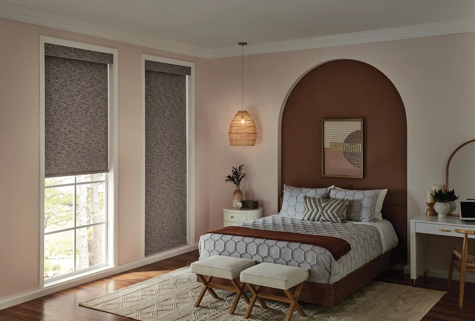 Solar shades - Pearl & Co Textured brown roller shades on tall bedroom windows, one partly raised