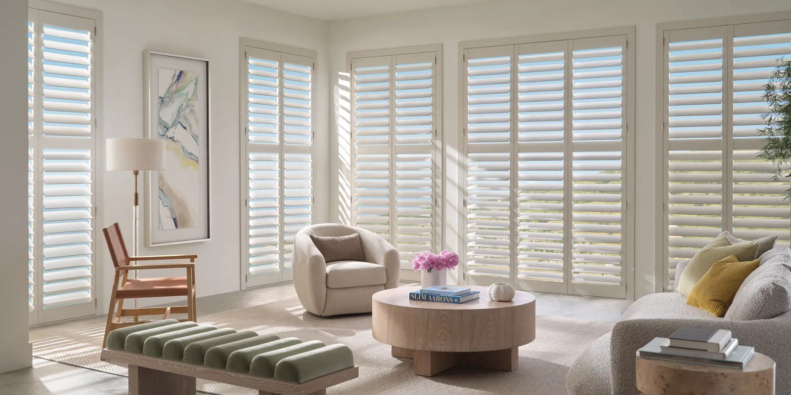 hunter-douglas-heritance-shutters-living-room-mesa-az - Pearl & Co Wood shutters in a bright Mesa AZ living room